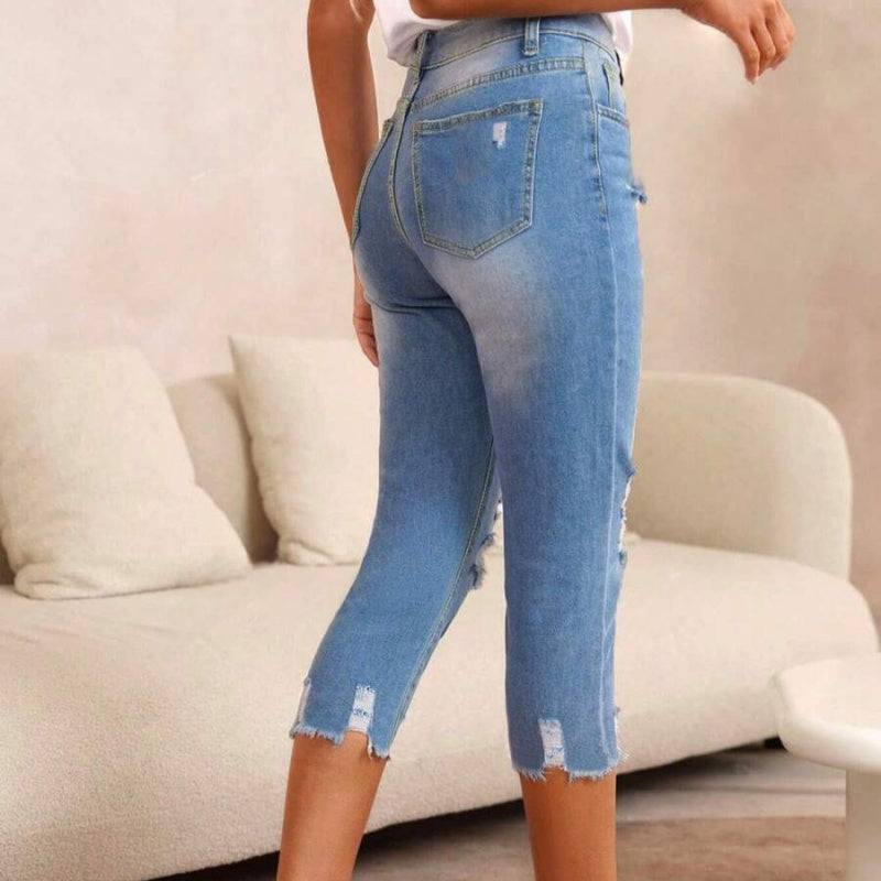 💥Fashion Women's Ripped Washed Jeans with Raw Hem Detail