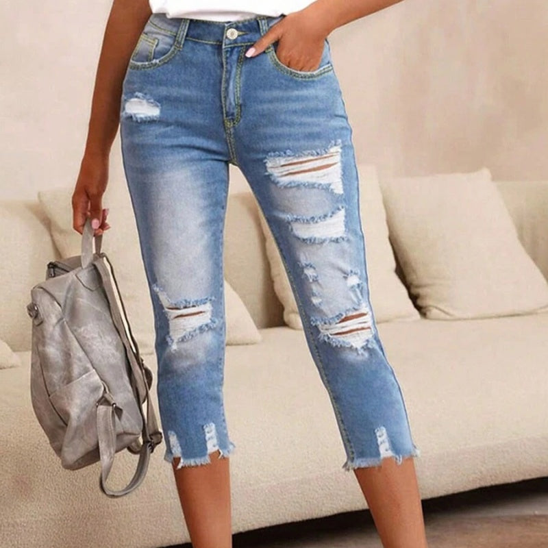 💥Fashion Women's Ripped Washed Jeans with Raw Hem Detail