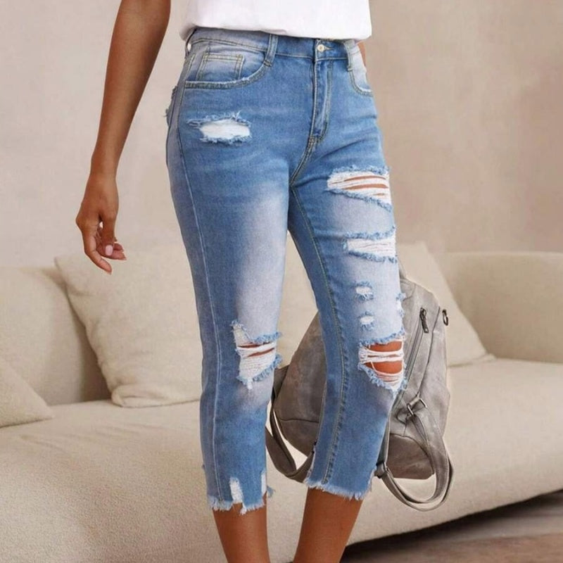 💥Fashion Women's Ripped Washed Jeans with Raw Hem Detail