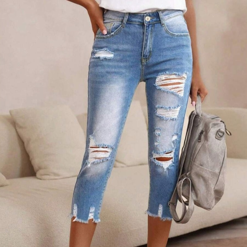 💥Fashion Women's Ripped Washed Jeans with Raw Hem Detail